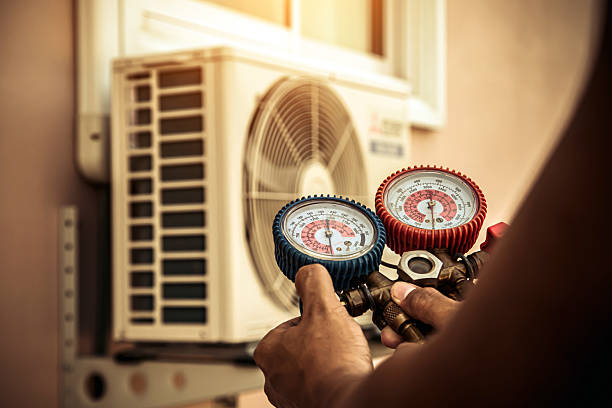 Professional Hvac technician working in Apache Junction, AZ